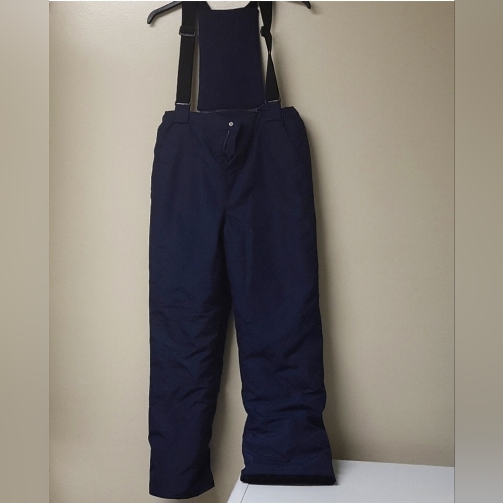 The childrens Place skin and  snowboard pants in blue and black color size 16